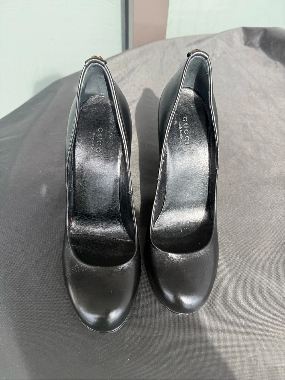 Authentic Gucci Black Leather Pumps with Gold GG logo